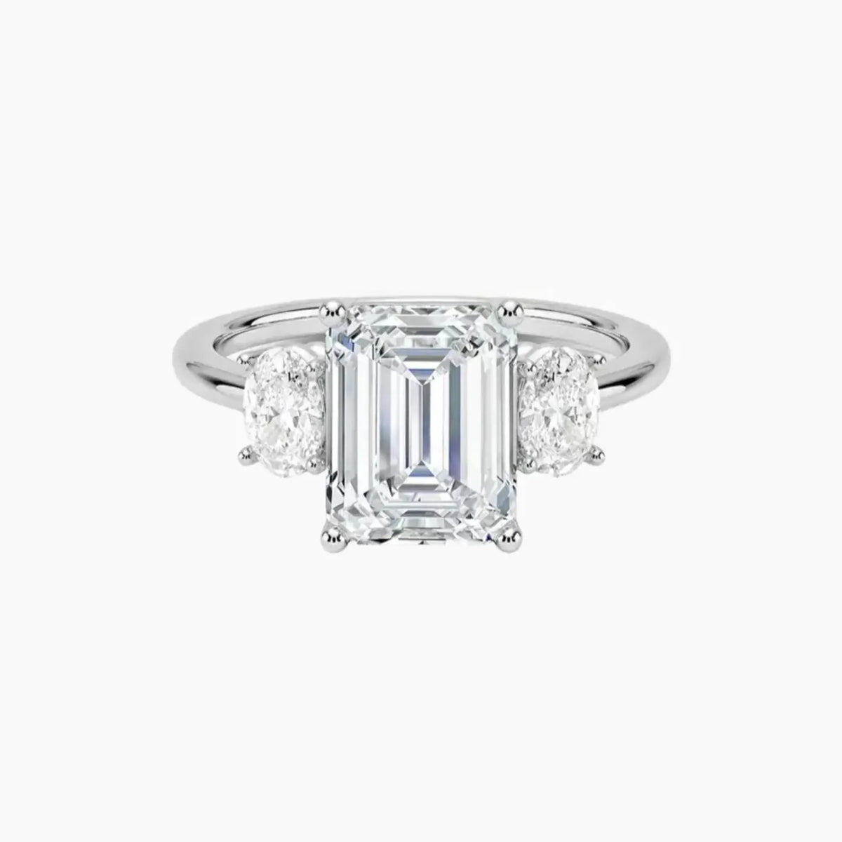 OBSER569 - Liora Three Stone Emerald engagement ring setting view 1