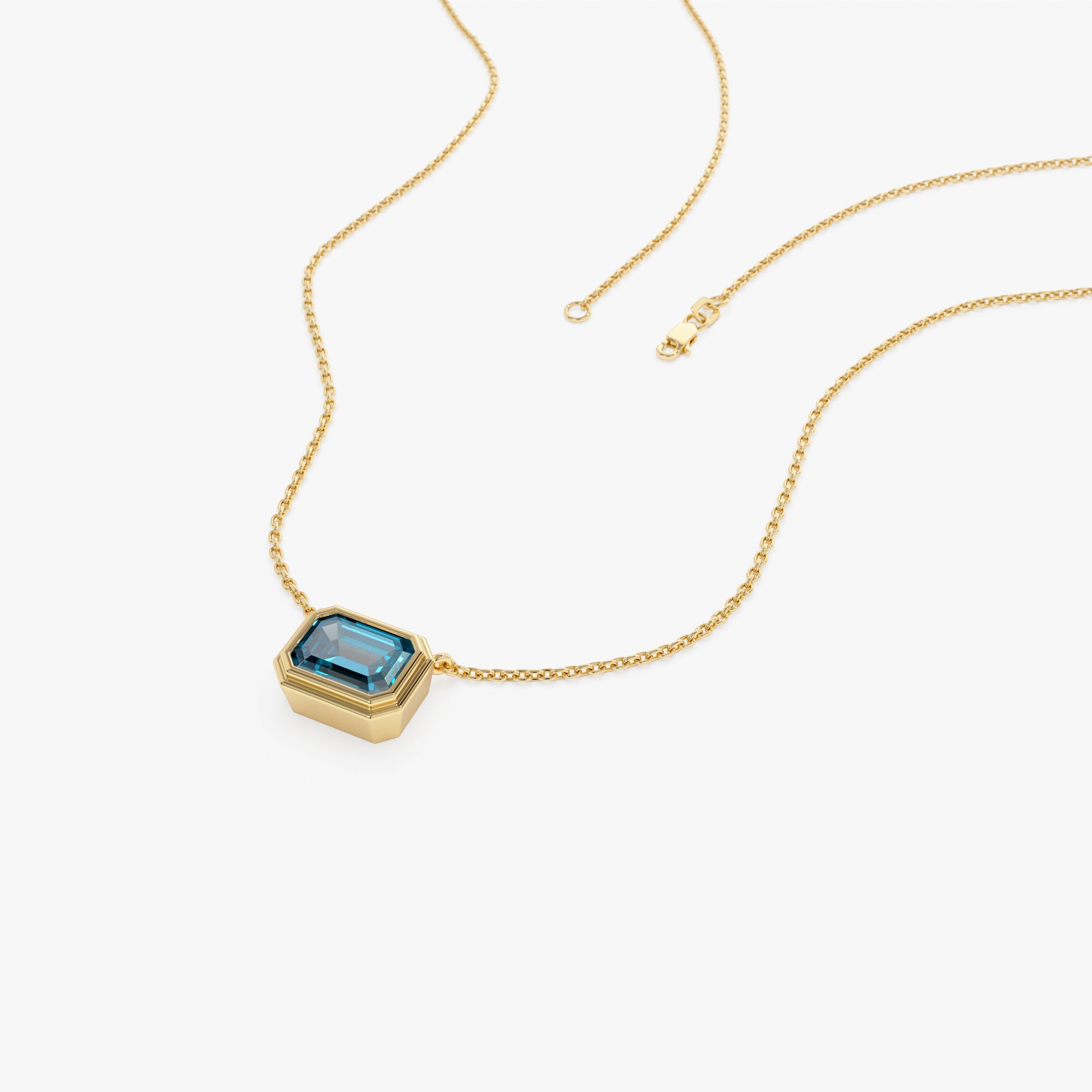 OBFJ0830 - 14K Gold 1.25 ctw Emerald Cut Bezel Setting Blue Topaz 7