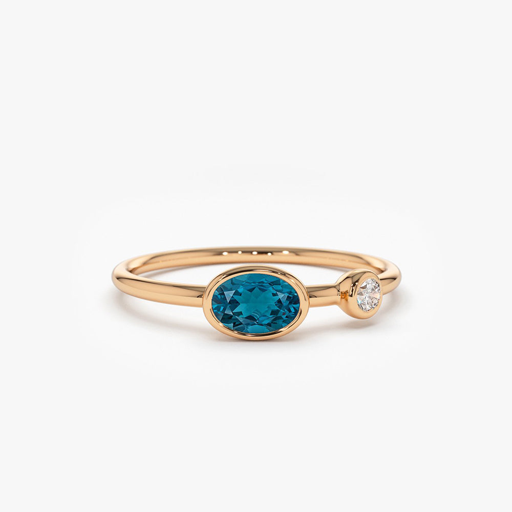 OBFJ1772 - 14k Gold Oval London Blue Topaz and Diamond Ring 7