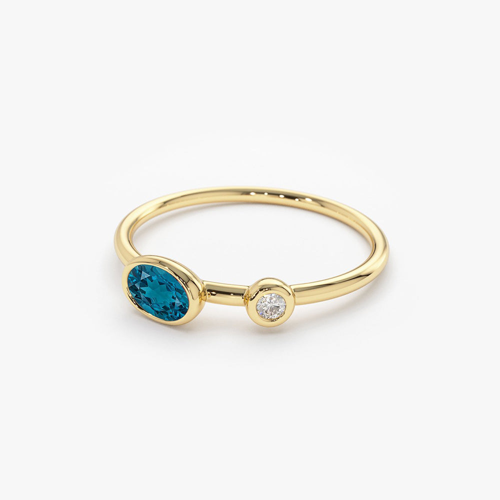 OBFJ1772 - 14k Gold Oval London Blue Topaz and Diamond Ring 9