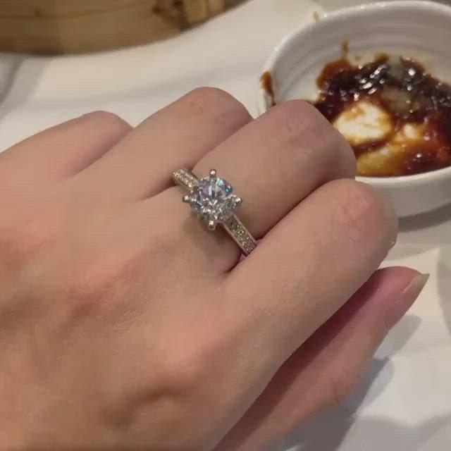 T9 - Four Prong Side Stone Engagement Rings